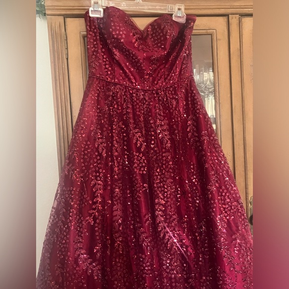 Beautiful strapless burgundy embellished gown. - Picture 6 of 6